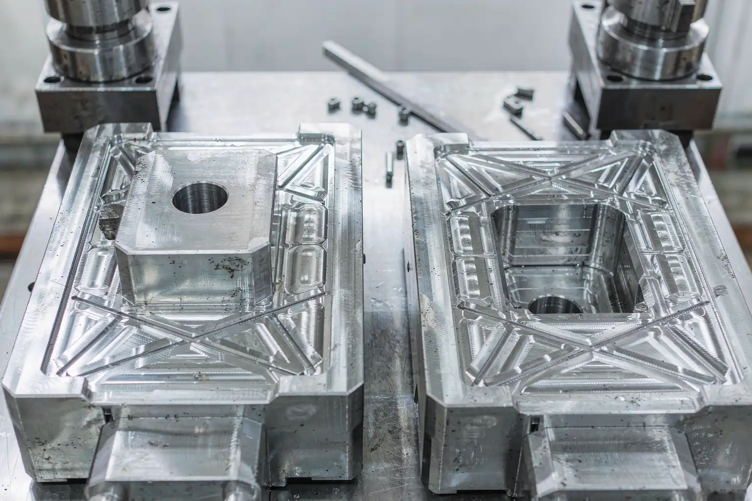 aluminum-die-casting-mold-design-guide.png Aluminum die-casting mold with cores and inserts in a tool room