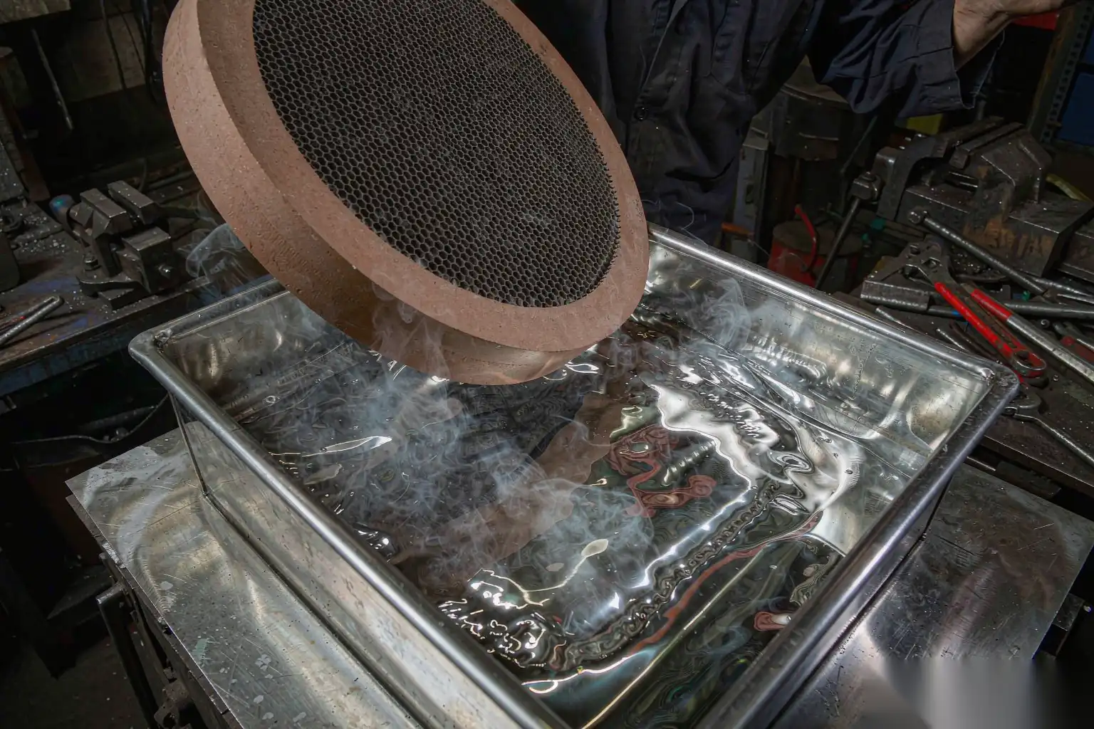 Ceramic foam filter being placed before casting aluminum