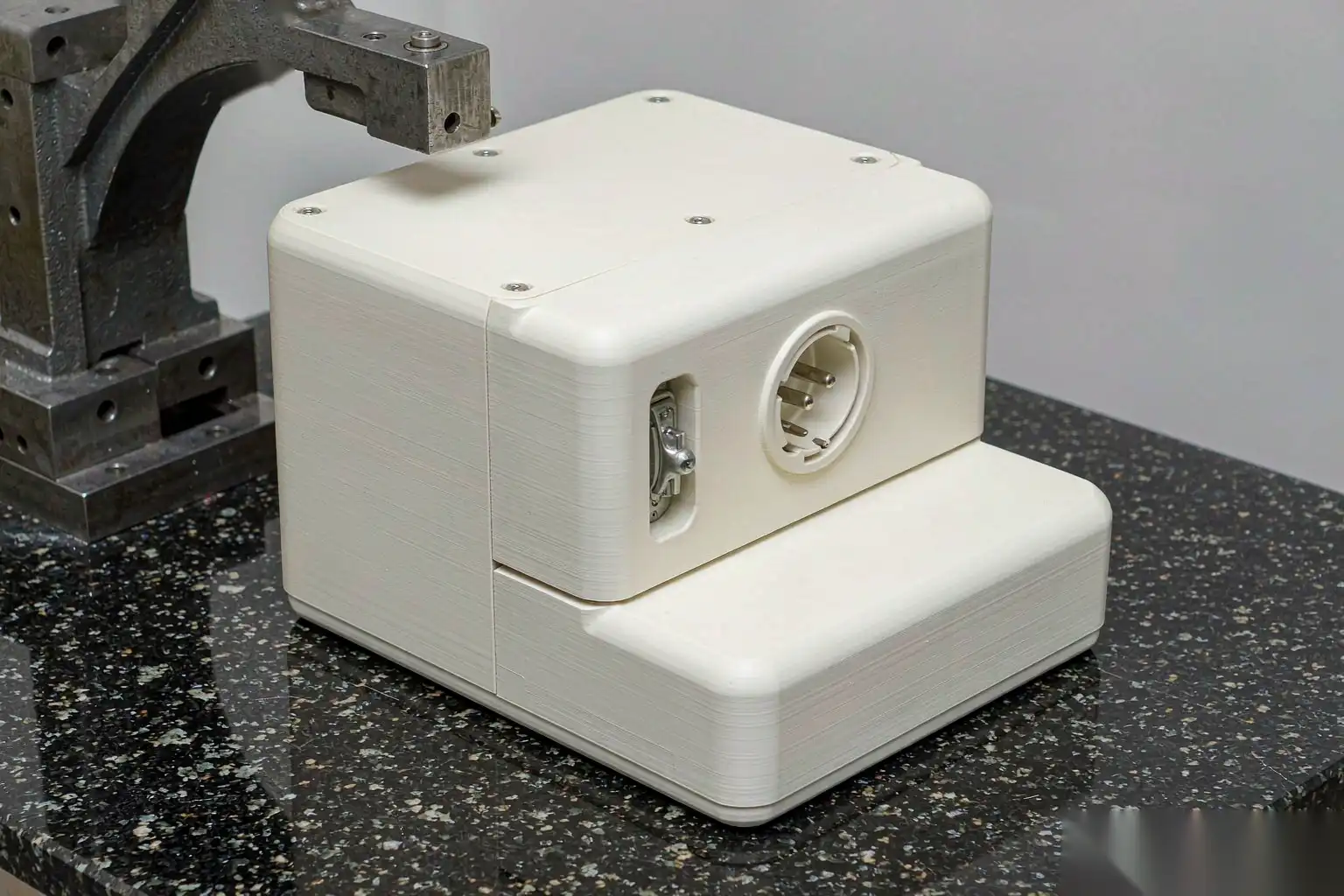 Finished die cast medical enclosure on an inspection table