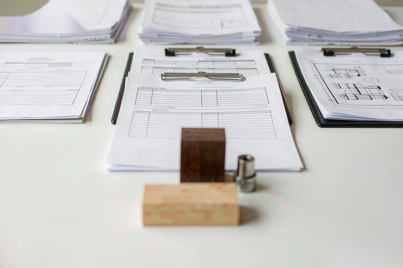 Quality documents and inspection records on a supplier audit table