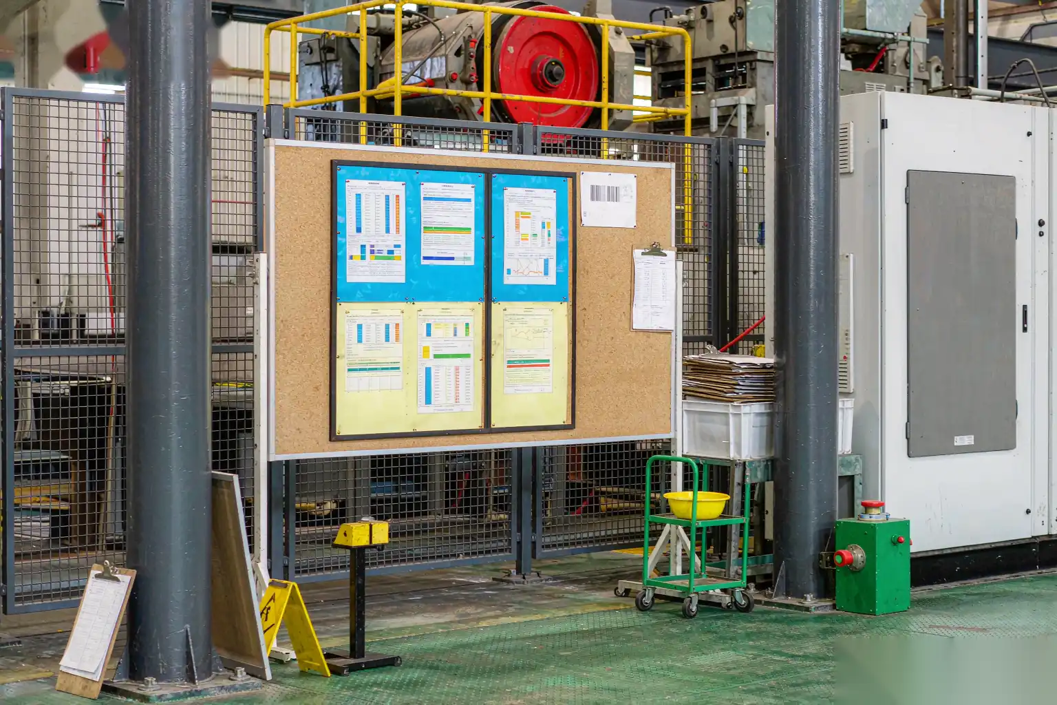 Supervisor reviewing scrap statistics on the die casting floor
