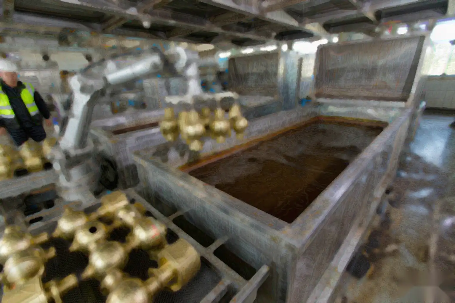 Automated electroplating line with robotic racking feeding a faucet plating bath